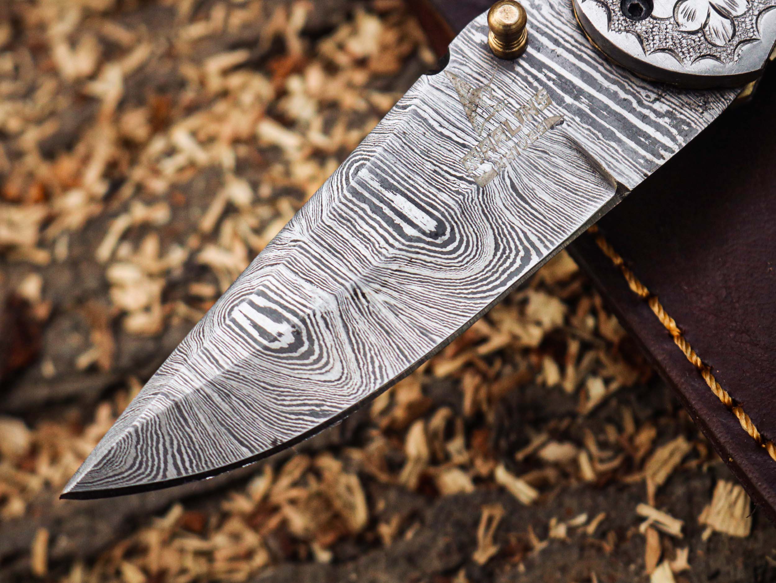 Handcrafted Damascus Steel Folding Knife: Precision and Artistry in Every Fold – Just $84