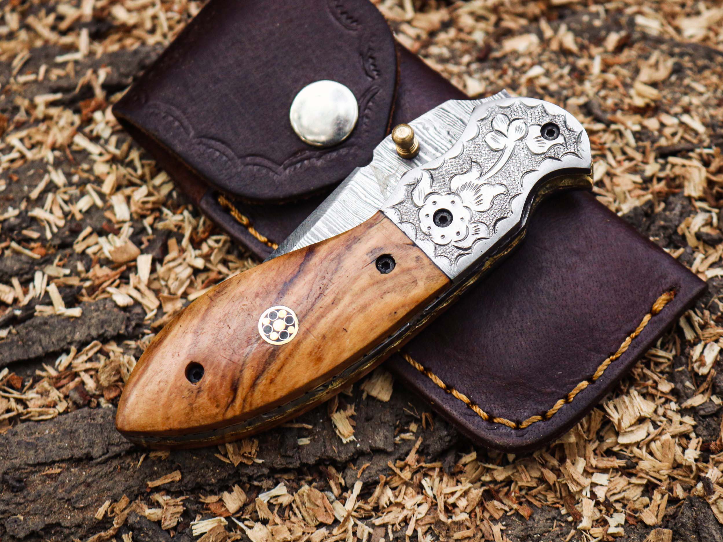 Handcrafted Damascus Steel Folding Knife: Precision and Artistry in Every Fold – Just $84