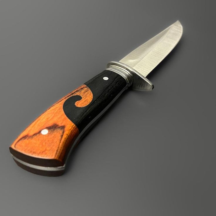 Tan and Black Hunting Knife